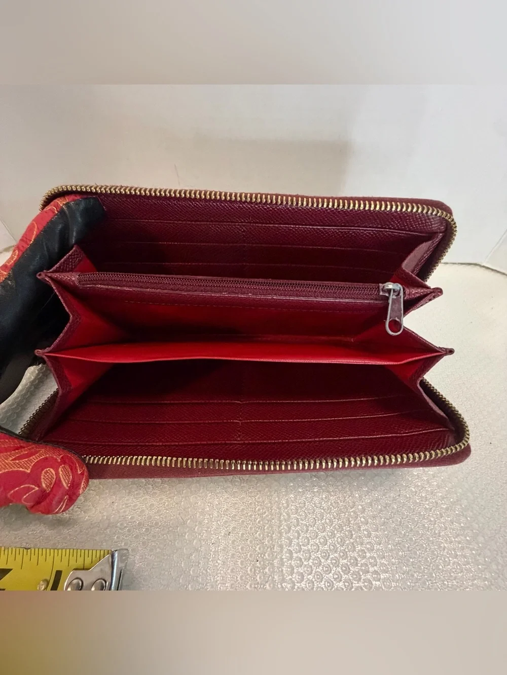 Dooney & Bourke Wine Textured Zip Wallet with Gold Plaque